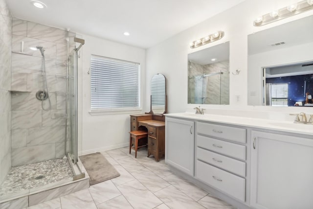 bathroom featuring double vanity, visible vents, a sink, and a stall shower