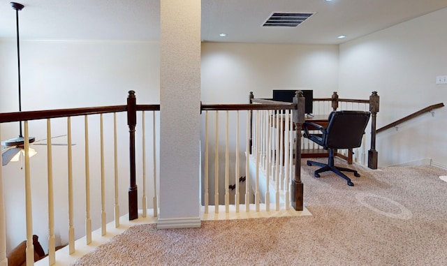 office space featuring carpet flooring and ceiling fan