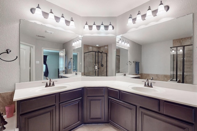 2924 Peyton Brook Dr, Fort Worth, TX 76137 - full bath featuring double vanity, a sink, and a stall shower