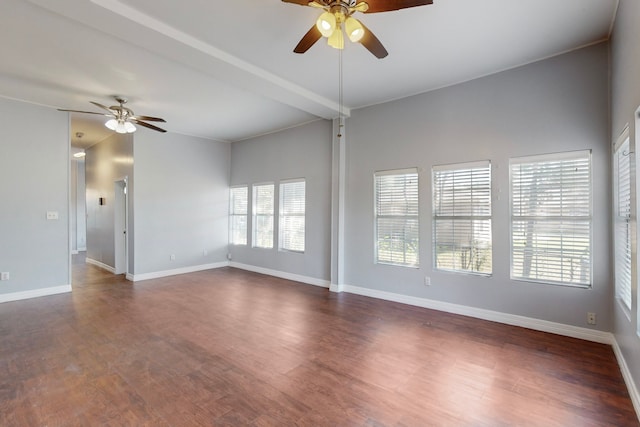 spare room with dark hardwood / wood-style floors and ceiling fan