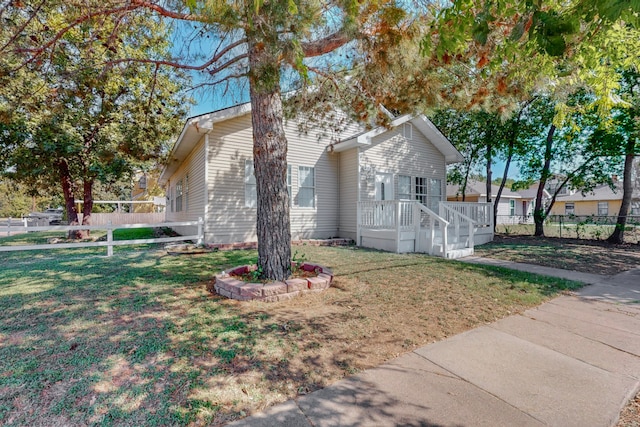 view of home's exterior featuring a lawn