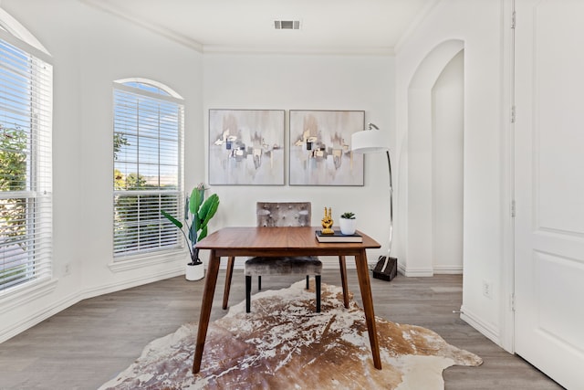 office featuring ornamental molding and hardwood / wood-style floors