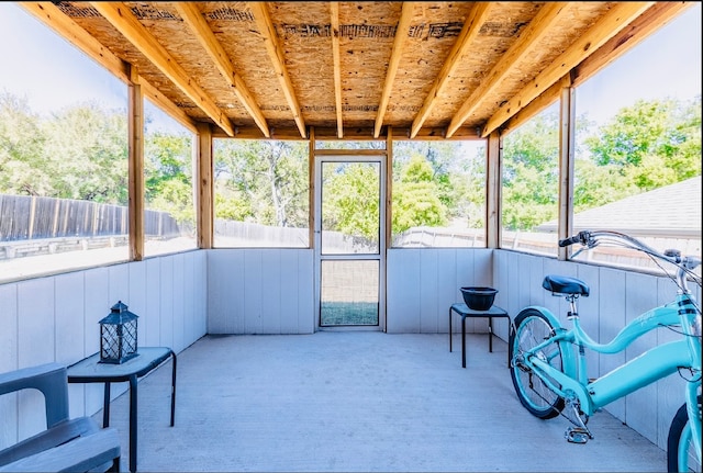 sunroom / solarium featuring a healthy amount of sunlight