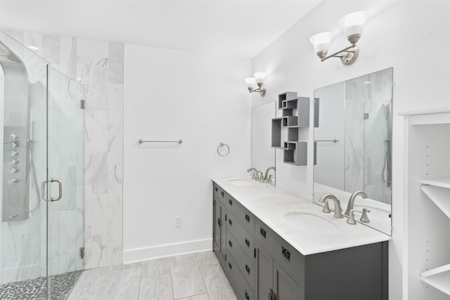 926 S Waverly Dr, Dallas, TX 75208 - full bathroom with a shower stall, double vanity, and baseboards