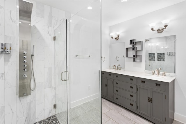 926 S Waverly Dr, Dallas, TX 75208 - bathroom featuring baseboards, a shower stall, and double vanity