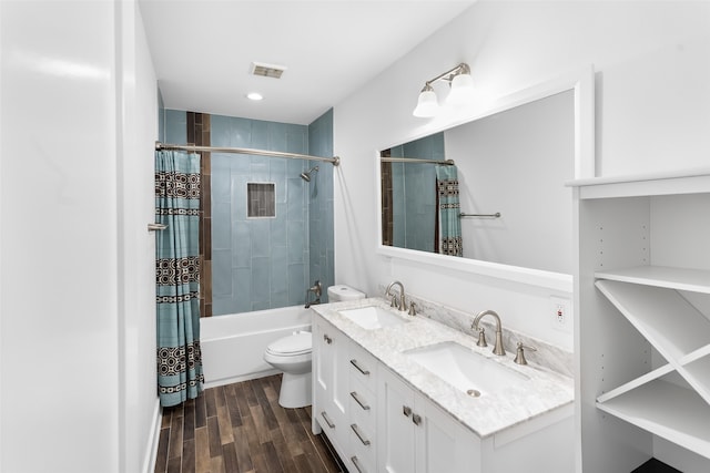 full bathroom featuring toilet, vanity, shower / bath combo, and wood-type flooring