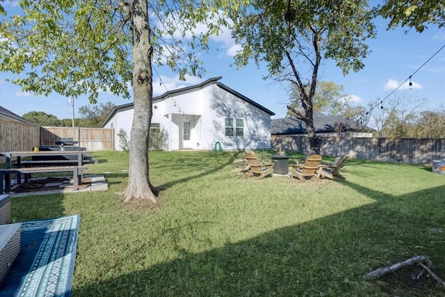 2604 Flora Ln, Denison, TX 75020 - view of yard with a fire pit