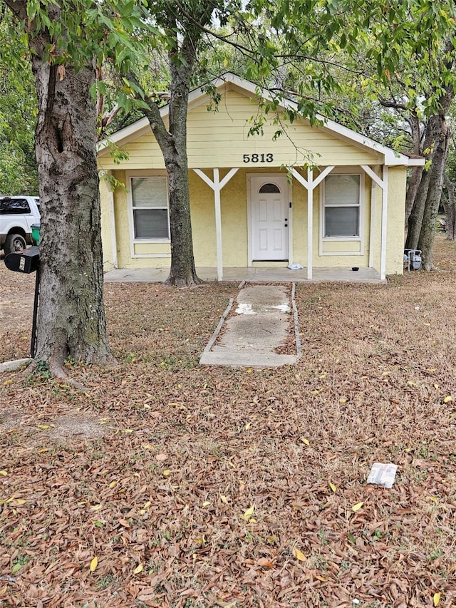 view of front of house with covered porch