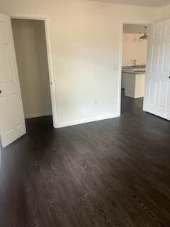 spare room featuring dark hardwood / wood-style floors