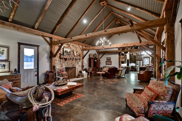 living room featuring high vaulted ceiling, beamed ceiling, a stone fireplace, and concrete floors