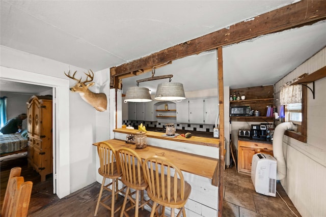 kitchen featuring dark hardwood / wood-style flooring