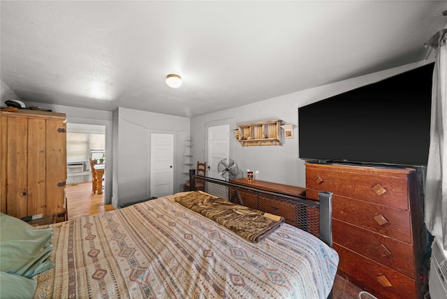 bedroom featuring dark wood-type flooring