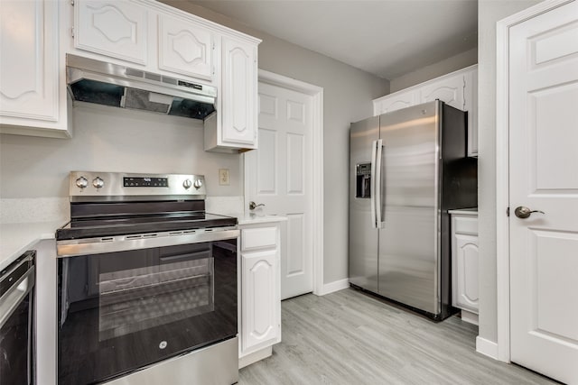 kitchen featuring light wood-type flooring, stainless steel appliances, extractor fan, white cabinetry, and wine cooler