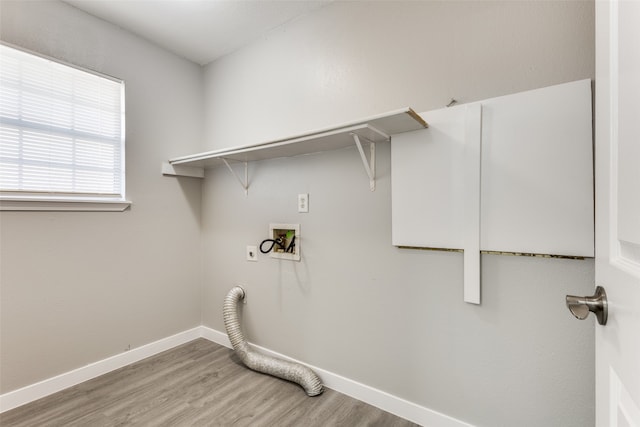 laundry area with wood-type flooring, hookup for a washing machine, and electric dryer hookup