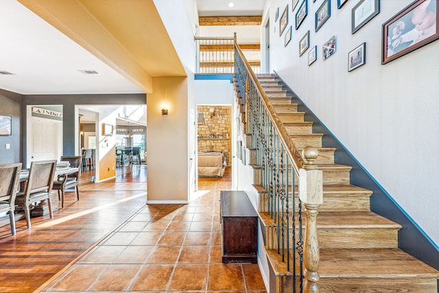 stairs with hardwood / wood-style flooring