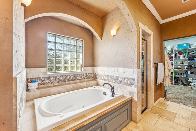 tiled bedroom with crown molding and ceiling fan