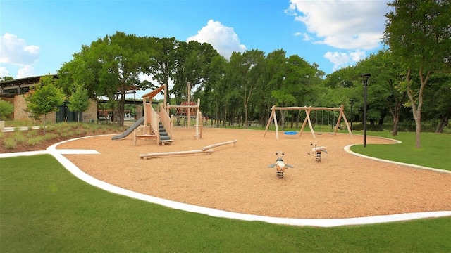 view of jungle gym with a yard