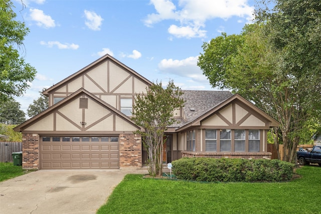 tudor house with a front lawn and a garage