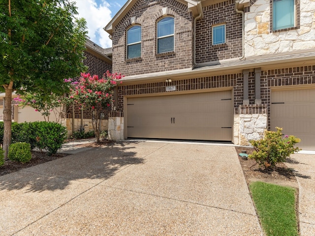 view of front of property with a garage