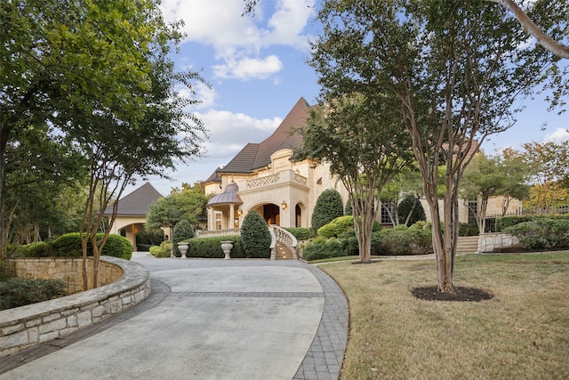 view of front of home with a front yard