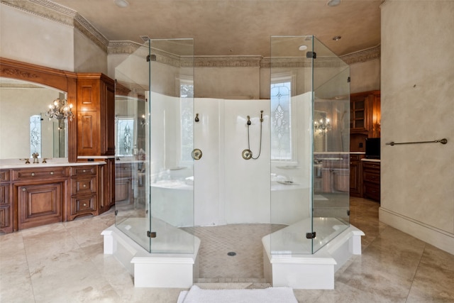 bathroom with vanity, shower with separate bathtub, and crown molding