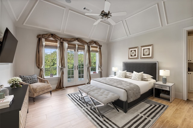 bedroom with ceiling fan, light hardwood / wood-style flooring, french doors, and access to exterior