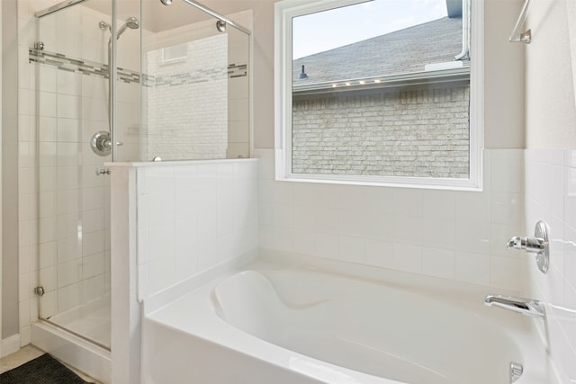 bathroom with independent shower and bath