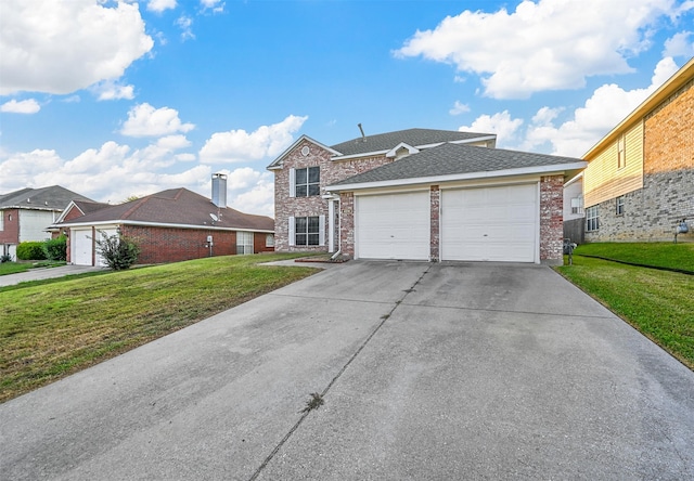 view of front of house featuring a front lawn and a garage