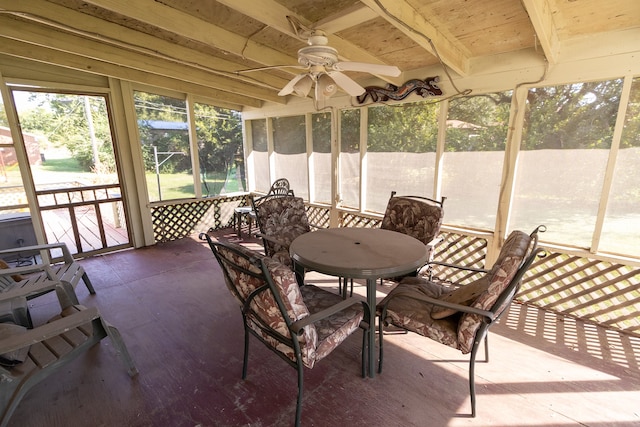 sunroom / solarium featuring ceiling fan