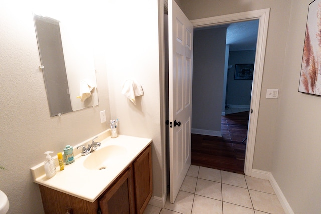 bathroom featuring vanity and hardwood / wood-style flooring