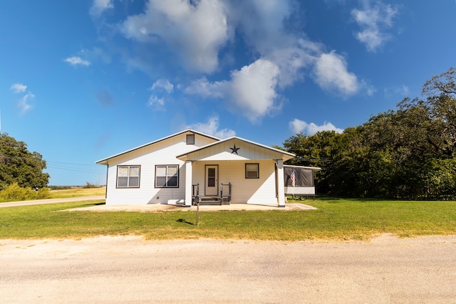 exterior space featuring a front lawn