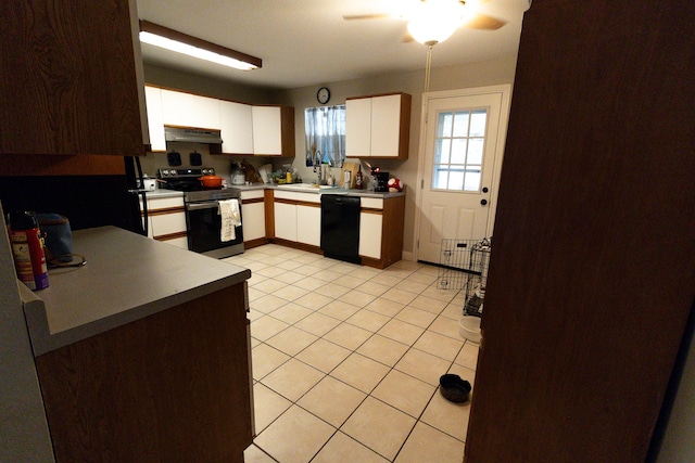 kitchen featuring light tile patterned flooring, ceiling fan, stainless steel range with electric cooktop, dishwasher, and white cabinetry