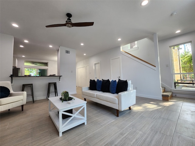 living room with ceiling fan