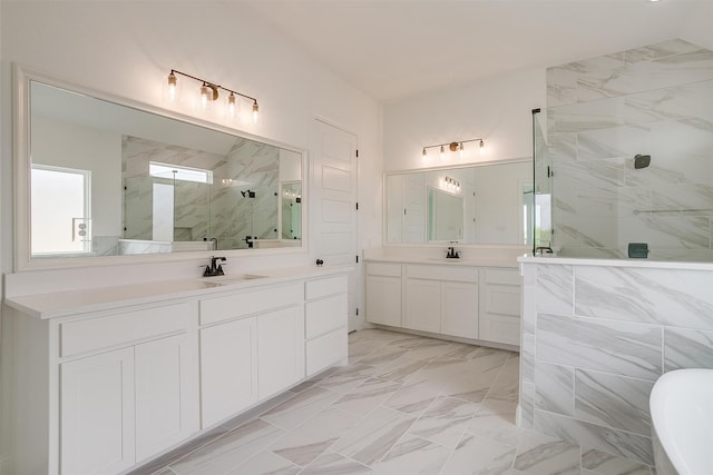 bathroom featuring vanity and an enclosed shower