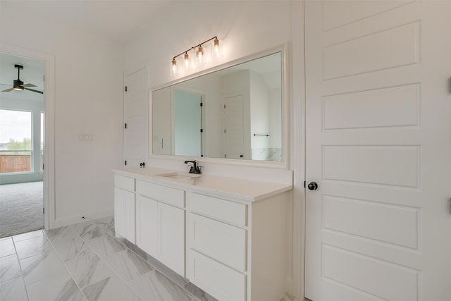 bathroom with ceiling fan and vanity