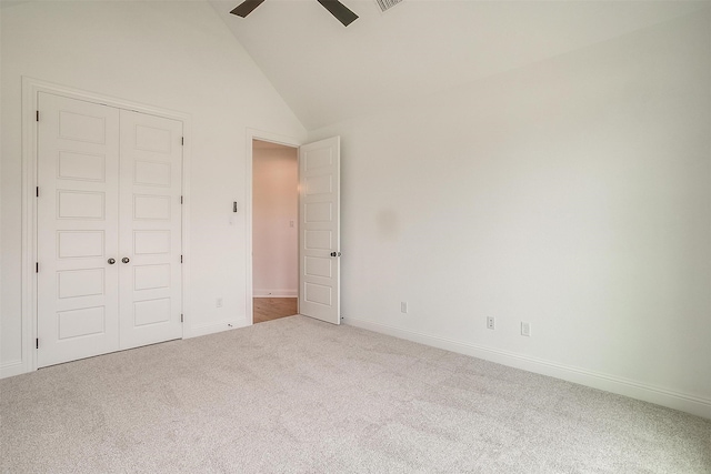 unfurnished bedroom with ceiling fan, a closet, and carpet flooring