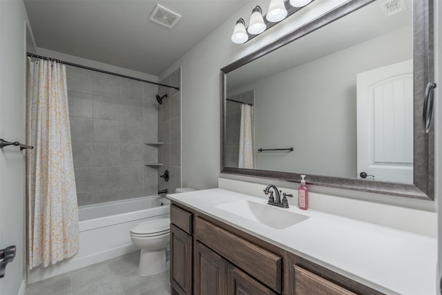 full bathroom with tile patterned floors, shower / bath combo, vanity, and toilet