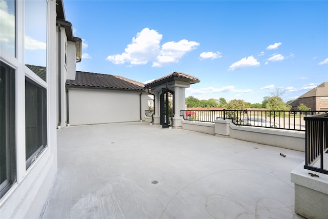 view of patio / terrace with a balcony