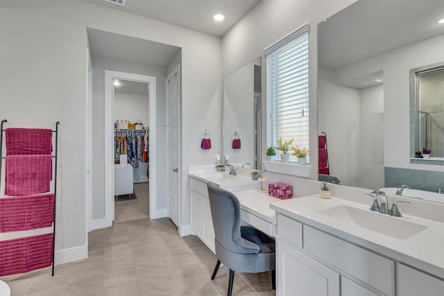 2104 Devonblue Dr, Forney, TX 75126 - full bath featuring vanity, a spacious closet, baseboards, recessed lighting, and a shower