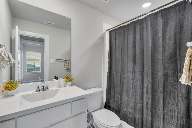 2104 Devonblue Dr, Forney, TX 75126 - full bathroom featuring toilet, vanity, a shower with curtain, and recessed lighting
