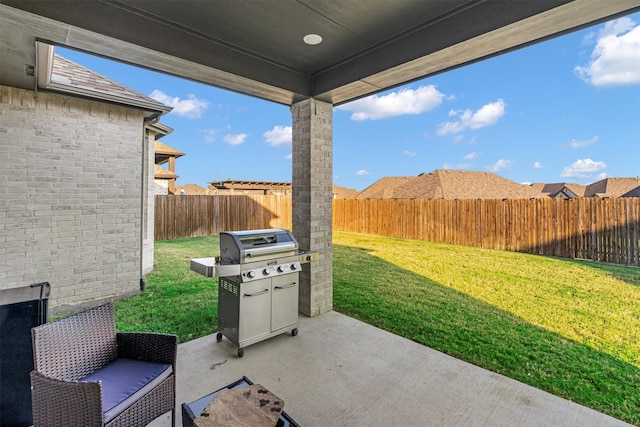 view of patio / terrace featuring a fenced backyard and area for grilling