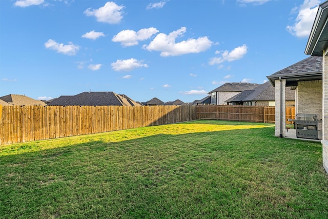 view of yard featuring a fenced backyard