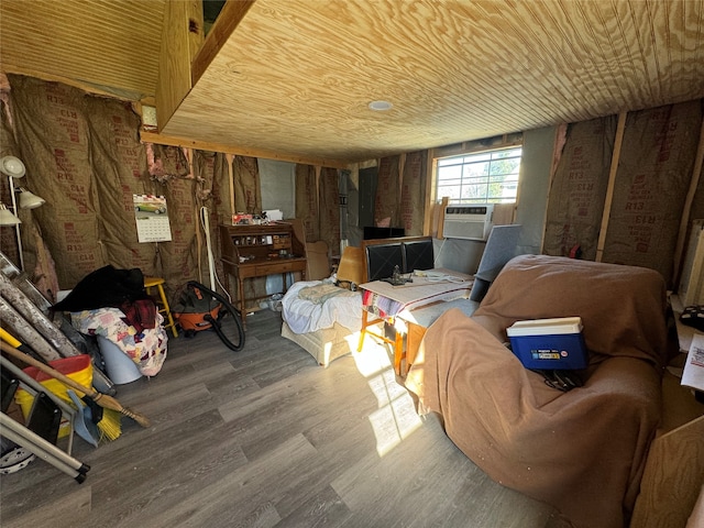 interior space featuring cooling unit, hardwood / wood-style floors, and wooden ceiling