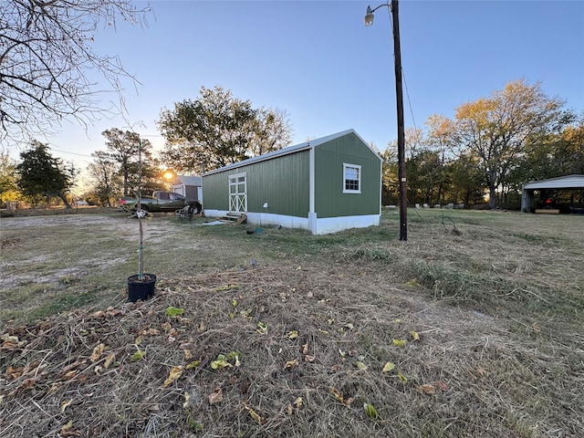 view of property exterior at dusk