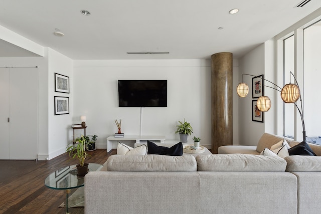 living room with dark hardwood / wood-style floors