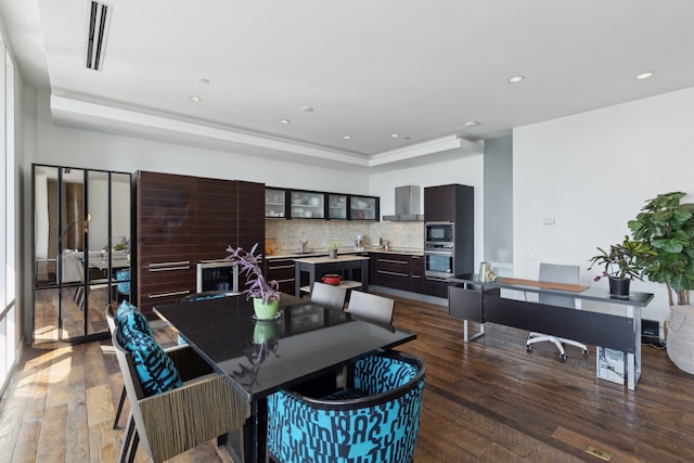 dining space featuring dark wood-type flooring