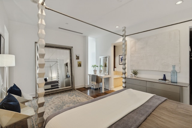 bedroom featuring dark wood-type flooring