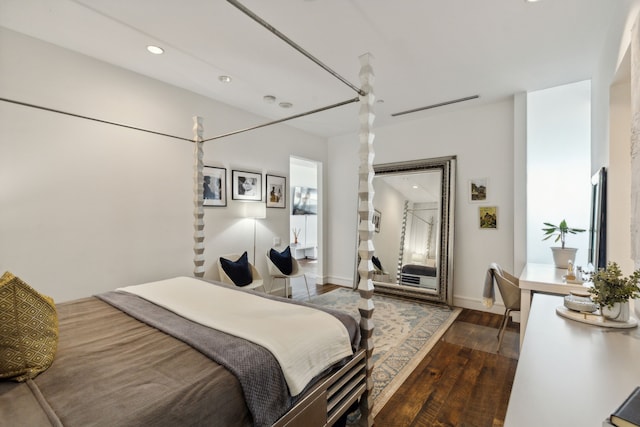 bedroom featuring dark wood-type flooring