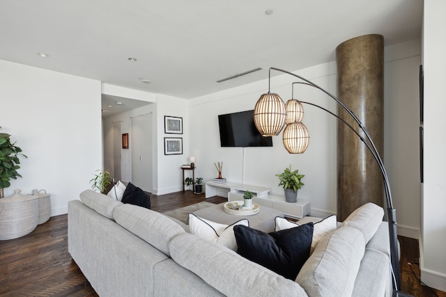 living room with dark hardwood / wood-style floors