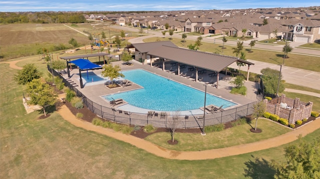 view of swimming pool featuring a patio area